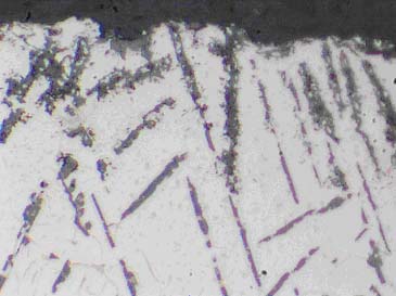 Thermal spray coating cross-section showing coating structure and interface with substrate